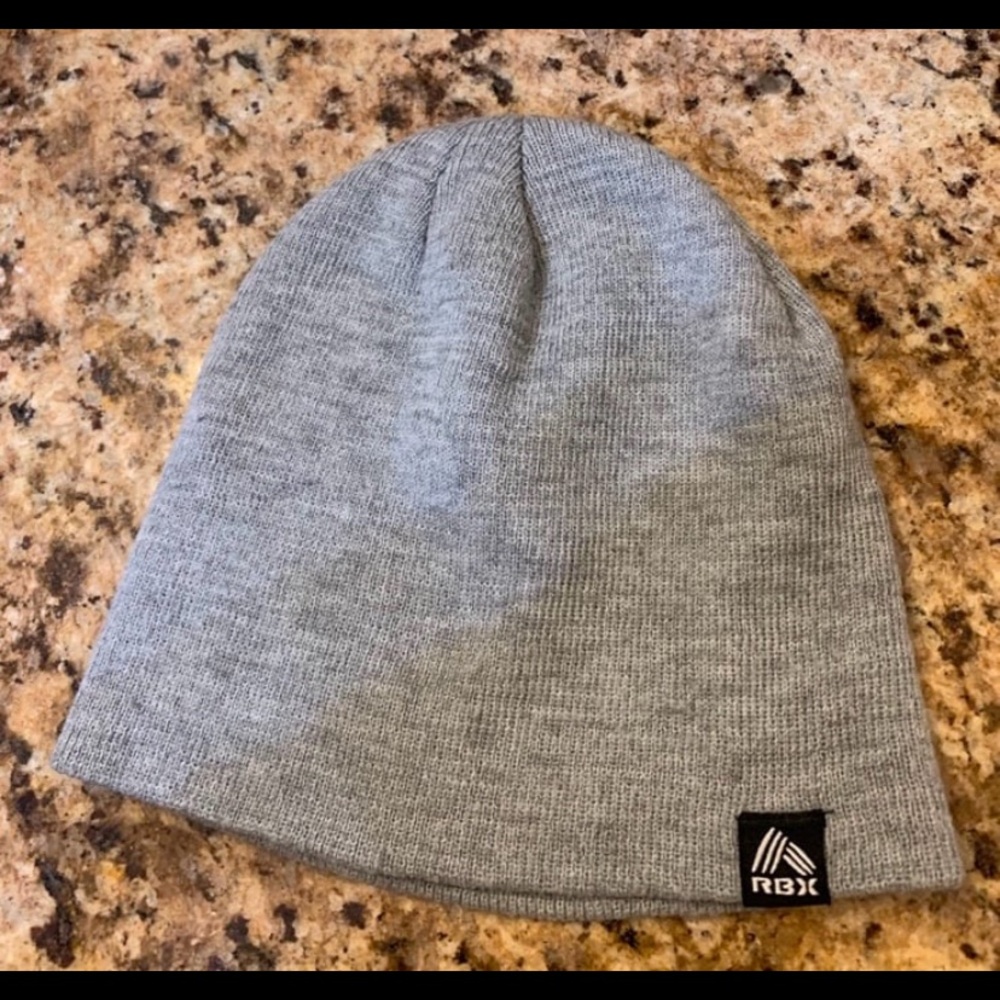 “RBX” Gray Unisex Beanie. One Size Fits Most. Material: 100% Acrylic.